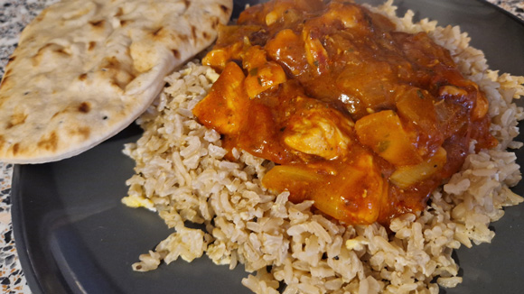 chicken curry and rice with naan bread cooked by Fishers Kitchen